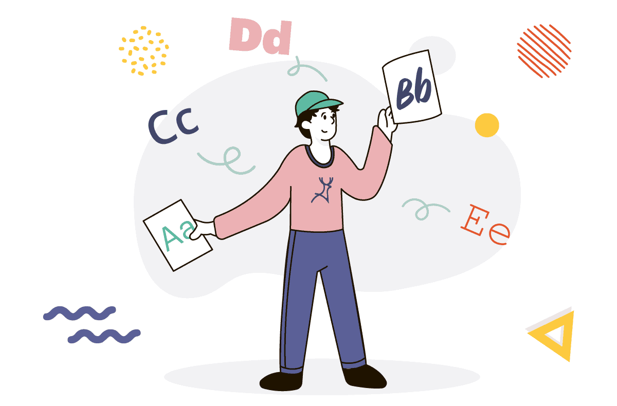 boy holding different letters